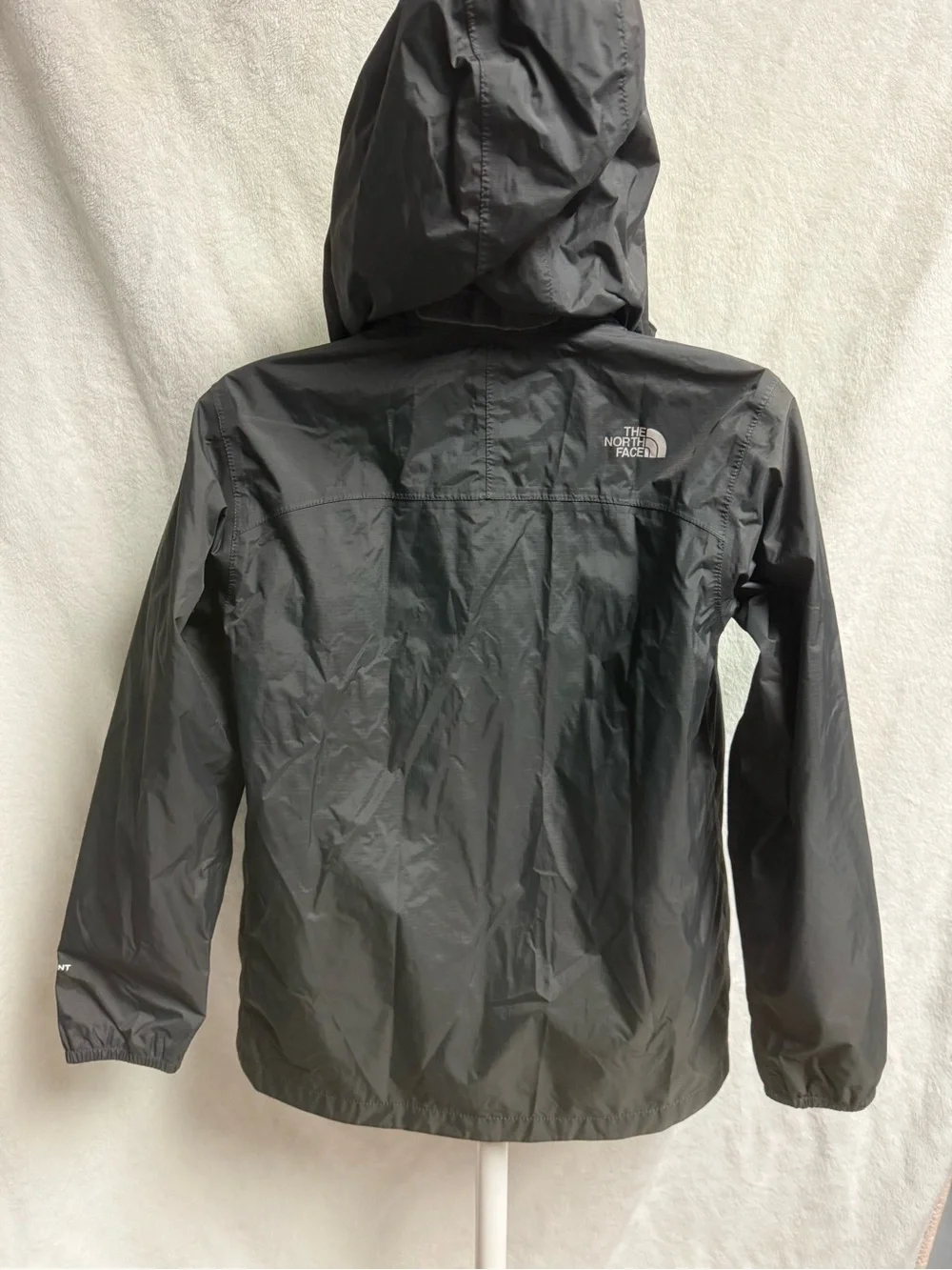The North Face Kids Black Raincoat with Neon Green Lining